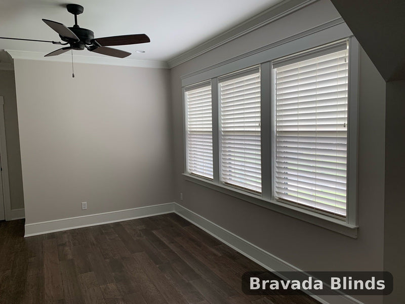 Customer installation - faux wood blinds in a living room