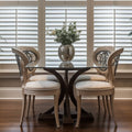 Bravada Louverstar Poly Interior Shutters - white poly shutters in a dining room