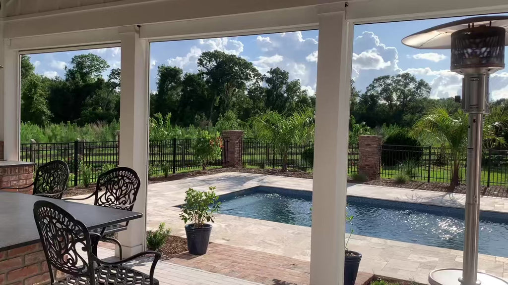 Customer installation - motorized exterior shades lowering over a patio