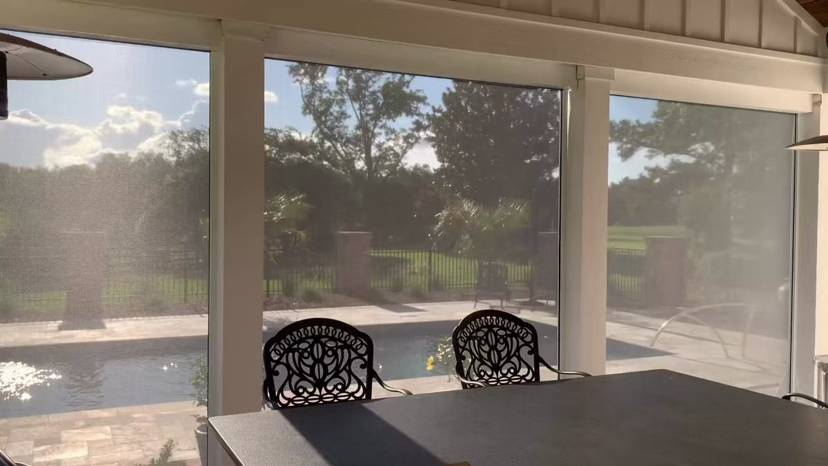Customer installation - motorized exterior shades raising over a patio